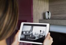 Offline Security: WiFi-Free Camera Systems for Enhanced Protection close up woman checking security camera