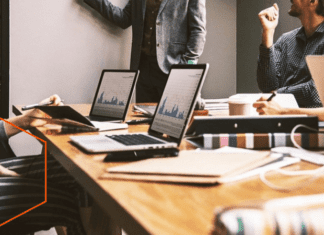 Unlock Growth with the Right Manufacturing Partner Business analytics with people in a meeting room